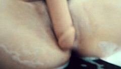 young girl plays with toy in hotel