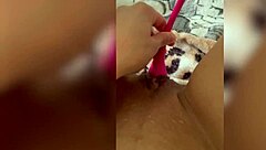 Masturbating close up with pink vibrator dildo