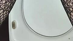 Desperate Need to Pee Captured in Close-Up Toilet Scene