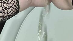 Desperate Need to Pee Captured in Close-Up Toilet Scene