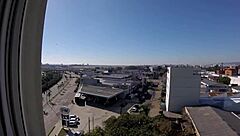 naked at hotel window in front of airport with big tits