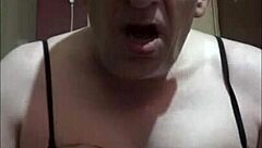 bisexual crossdressing sissy faggot shoots cumshot with strap-on dildo in ass