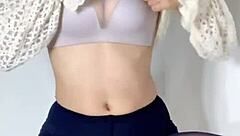 Is this brunette getting wet while preparing for work?