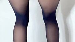 Is this brunette getting wet while preparing for work?