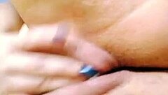 Young girl pleasures herself to climax