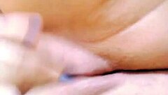 Young girl pleasures herself to climax