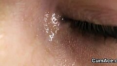 Frisky bombshell swallows cum in blowbang facial