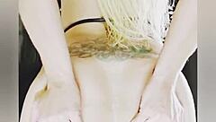 blonde plays with anal plug then fists herself