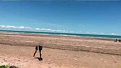 Wife flashes tits while playing nude at beach