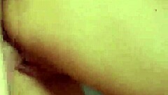 Teacher interacts with beautiful student in classroom setting during lesson