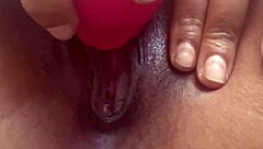 Ebony teen plays with pussy