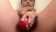 Ebony teen plays with pussy