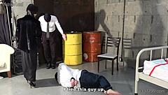 Masochistic man bound in debtor's hell with strapon