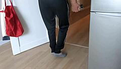 Wife entertains sofa deliveryman while husband works