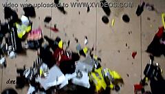 Exotic pornstar crushes big cars with boots in garage.