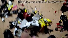 Exotic pornstar crushes big cars with boots in garage.