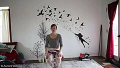 mature wife teaches yoga lesson with instructions