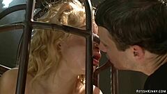 Why gag the blonde in that bird cage?