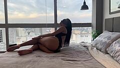 Skinny girl with small waist sits on husband in see through