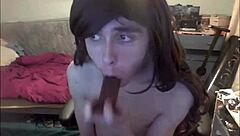 Shemale teen dildos her mouth and strokes her cock