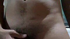 Teen twink spins around in gay video.