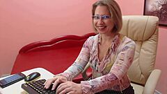 Mature Secretary Teases with Seductive Body Moves