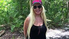 Kelley Cabbana indulges in public pussy play in the park, masturbating outdoors under the open sky.