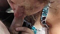 Fat BBW gives outdoor blowjob in public for voyeurs.