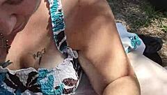 Fat BBW gives outdoor blowjob in public for voyeurs.