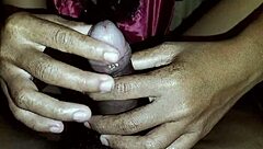 the beautiful asian neighbor gives a close-up handjob to her friend until he cums