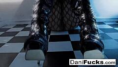 Sexy brunette Dani Daniels masturbates her big tits and pussy