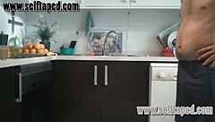 Steamy kitchen sex with a horny couple