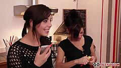 Sexy brunettes finger each other in bathroom