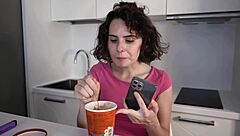 Darcy Dark eats ice cream while masturbating in kitchen