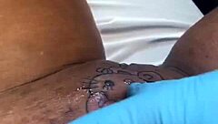 passionate tattoo session turns hardcore lesbian