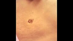 Ebony Woman in Heat Caresses Her Wet Pussy on Web Chat