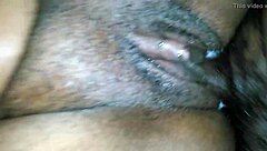 The wife moans as her creamy pussy receives a deep creampie, filling her completely with hot cum in their intimate bedroom encounter.