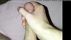 young guy at home massages his cock until he cums solo