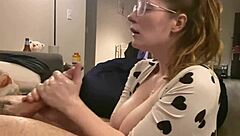 In a bodysuit, she receives a massive cumshot on her huge tits from a monster cock.