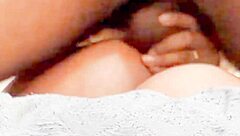 She grabs his cock tightly as he fucks her big ass passionately in close up