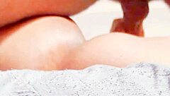 She grabs his cock tightly as he fucks her big ass passionately in close up